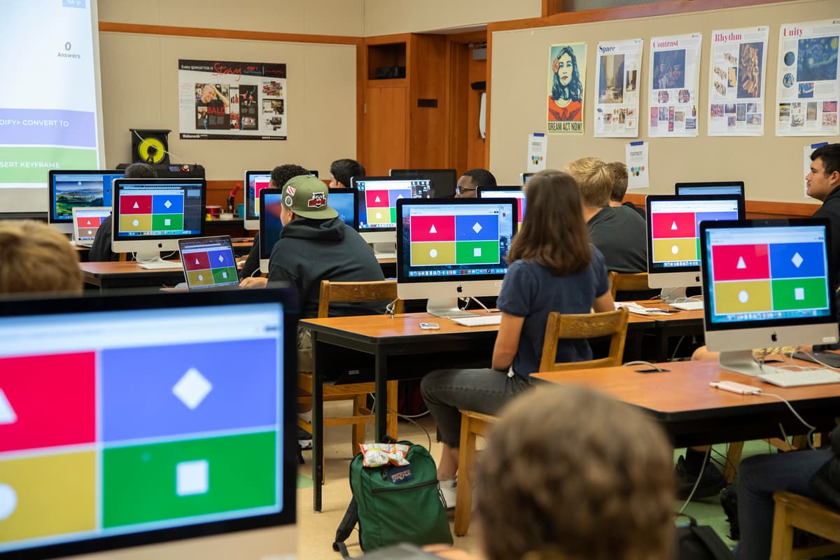Children in a classroom play Kahoot!